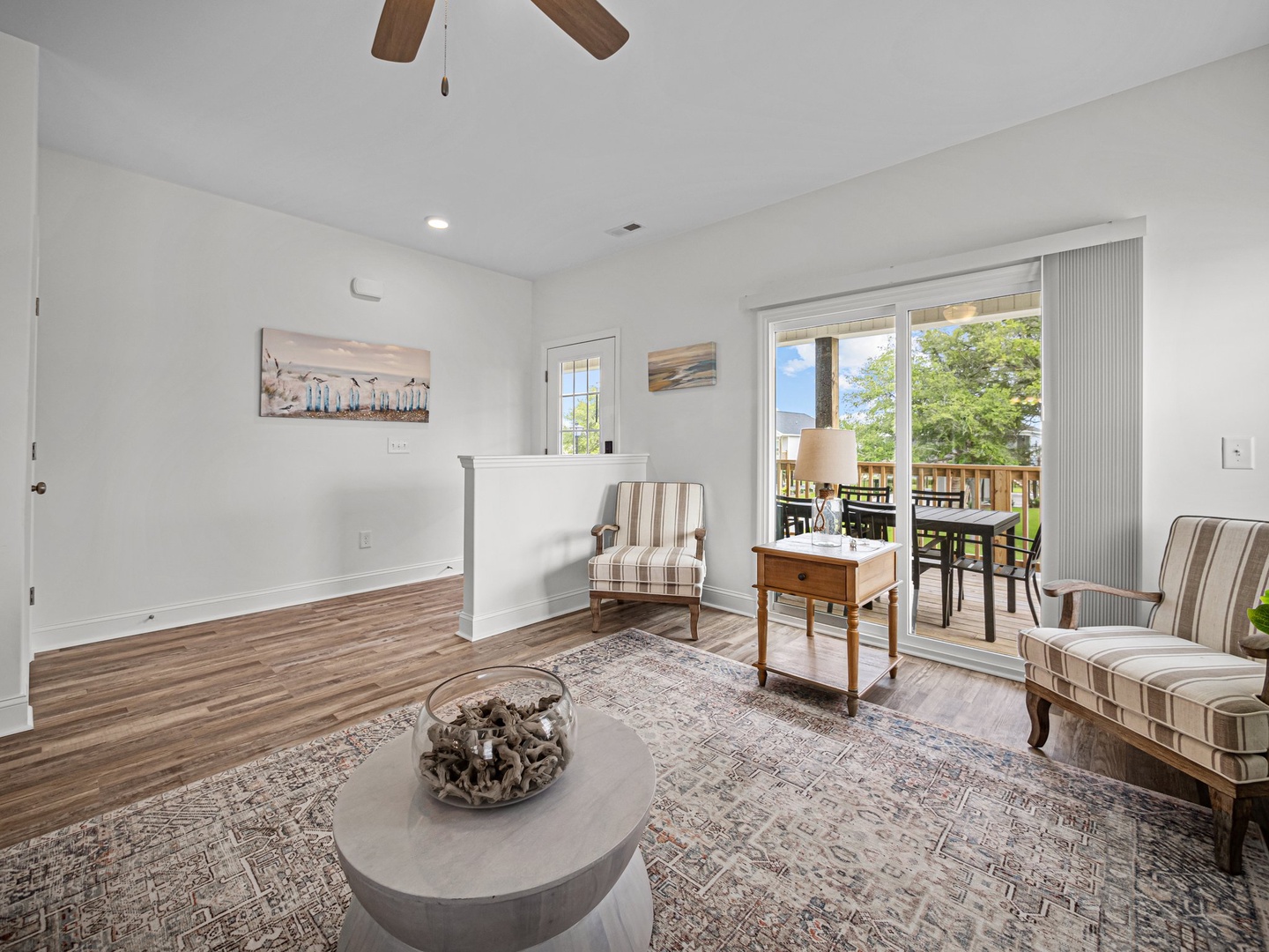 Relax in your bright, airy living space with classic charm and patio access for morning coffee or evening unwinding.