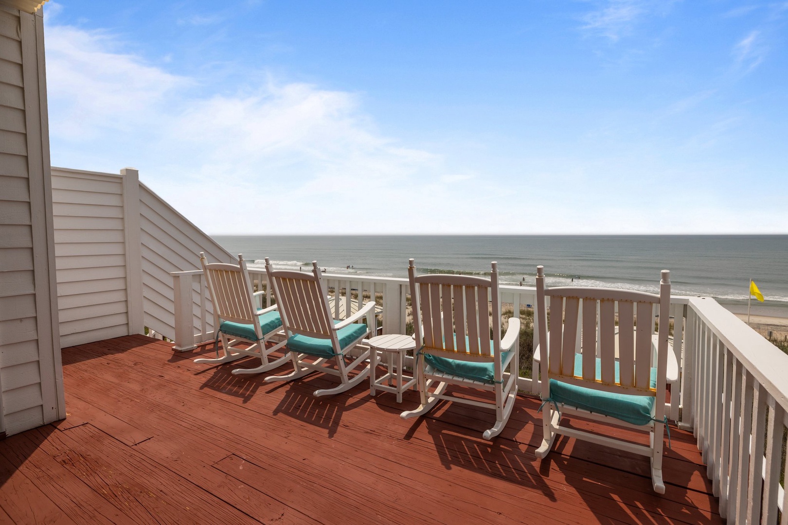 Relax in your private rocking chairs with stunning ocean views, perfect for morning coffee or evening sunsets.