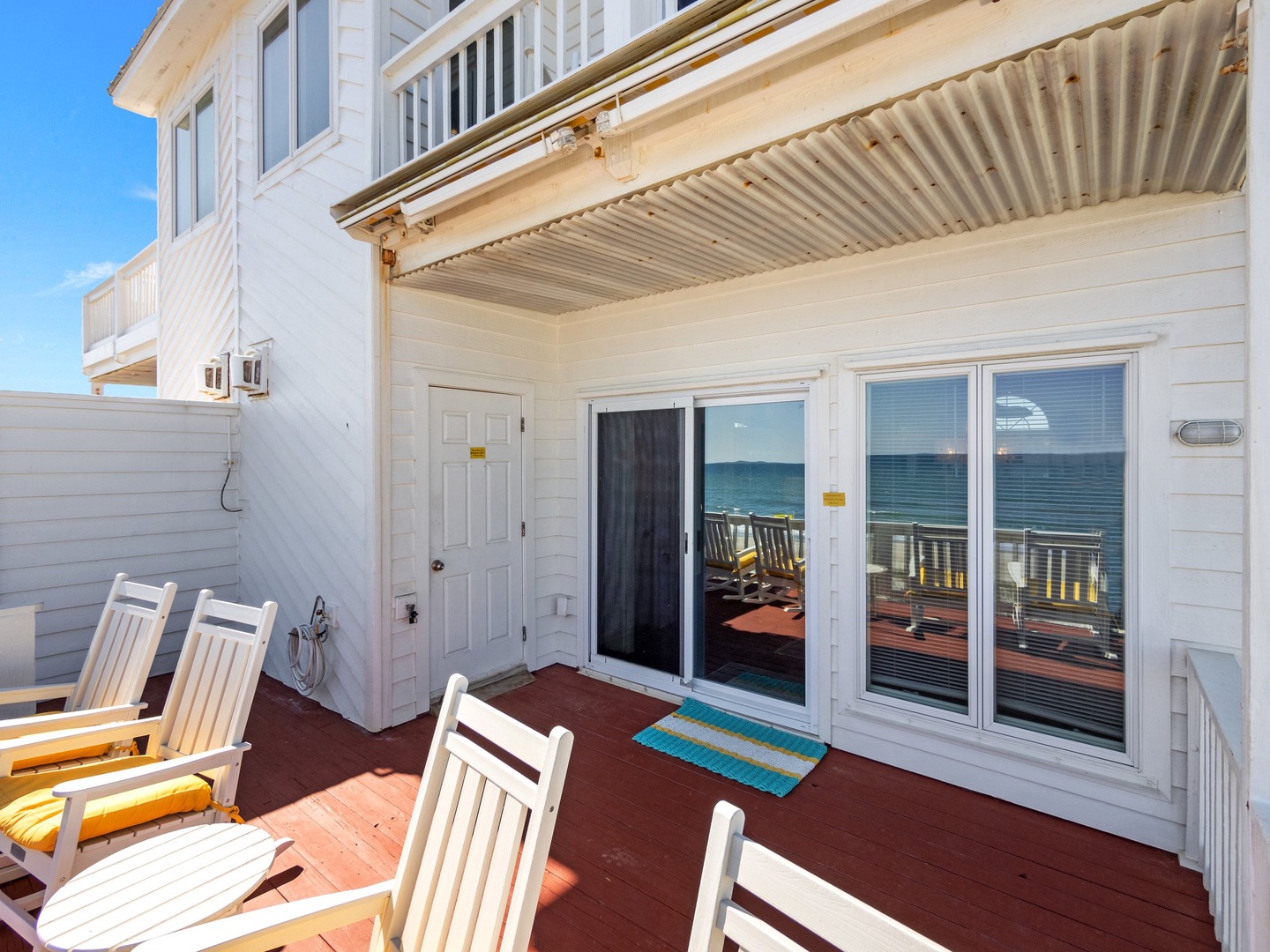 Step out onto your private deck where sun-soaked mornings unfold with ocean breeze and endless sea views right at your doorstep.