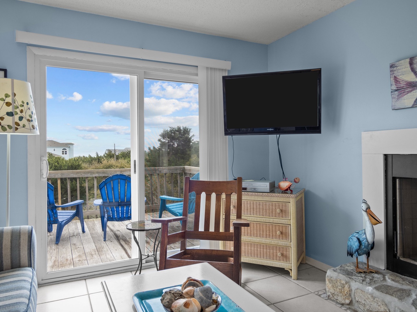 Relax in your bright living room with flat-screen TV and step onto your private deck for peaceful views.