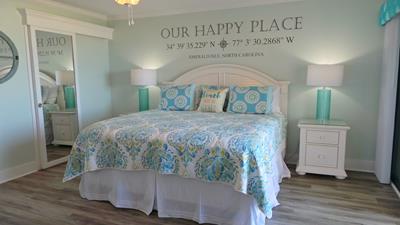 Drift off in your coastal retreat with soft blues and whites creating perfect seaside serenity for peaceful nights.
