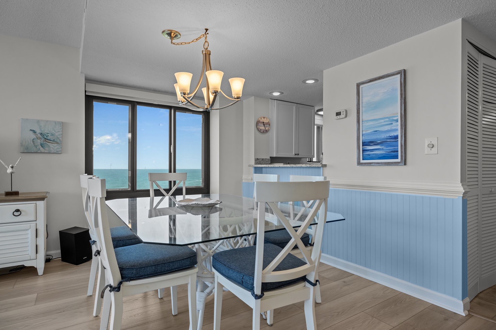 Savor meals with stunning ocean views from your elegant dining space, where coastal charm meets modern comfort.