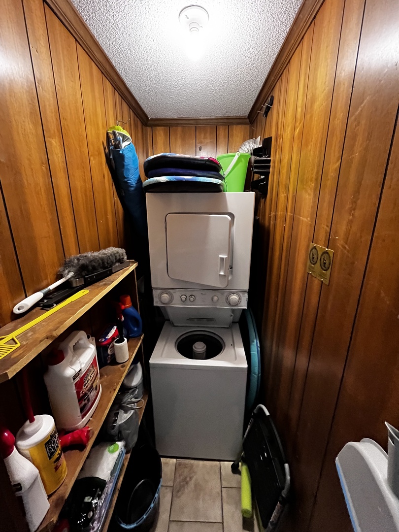 Your private laundry area keeps clothes fresh with washer, dryer, and handy storage for all your essentials.