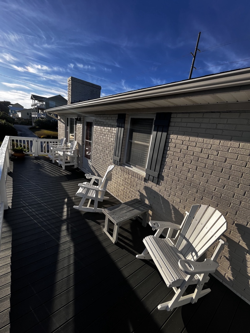 Modern apartment complex with distinctive architectural design featuring balconies and varied exterior materials.