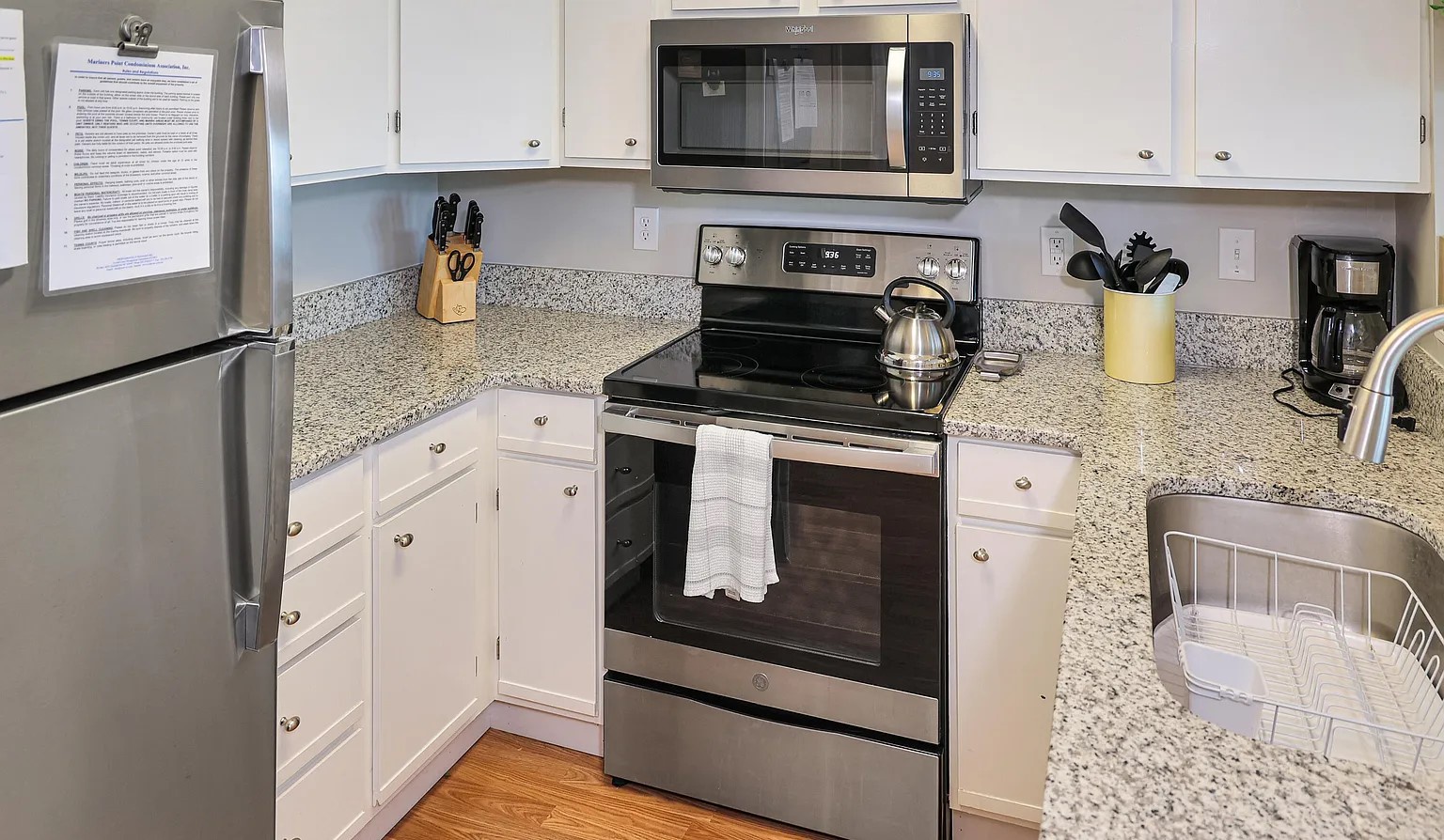 Your fully equipped kitchen features granite countertops, stainless steel appliances, and everything you need to create memorable meals together.