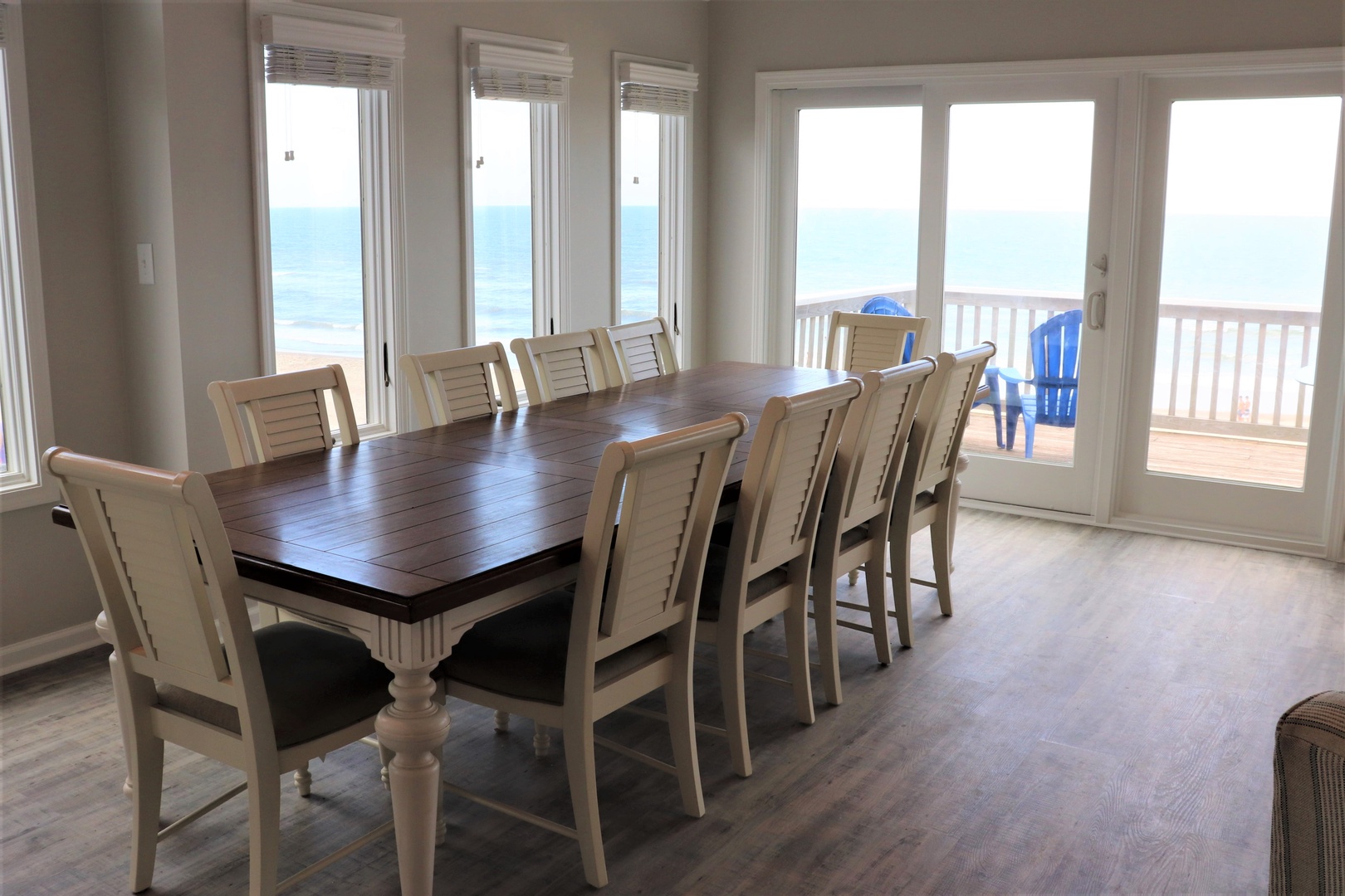 Your oceanfront dining space offers breathtaking sea views through floor-to-ceiling windows, perfect for memorable meals with loved ones.