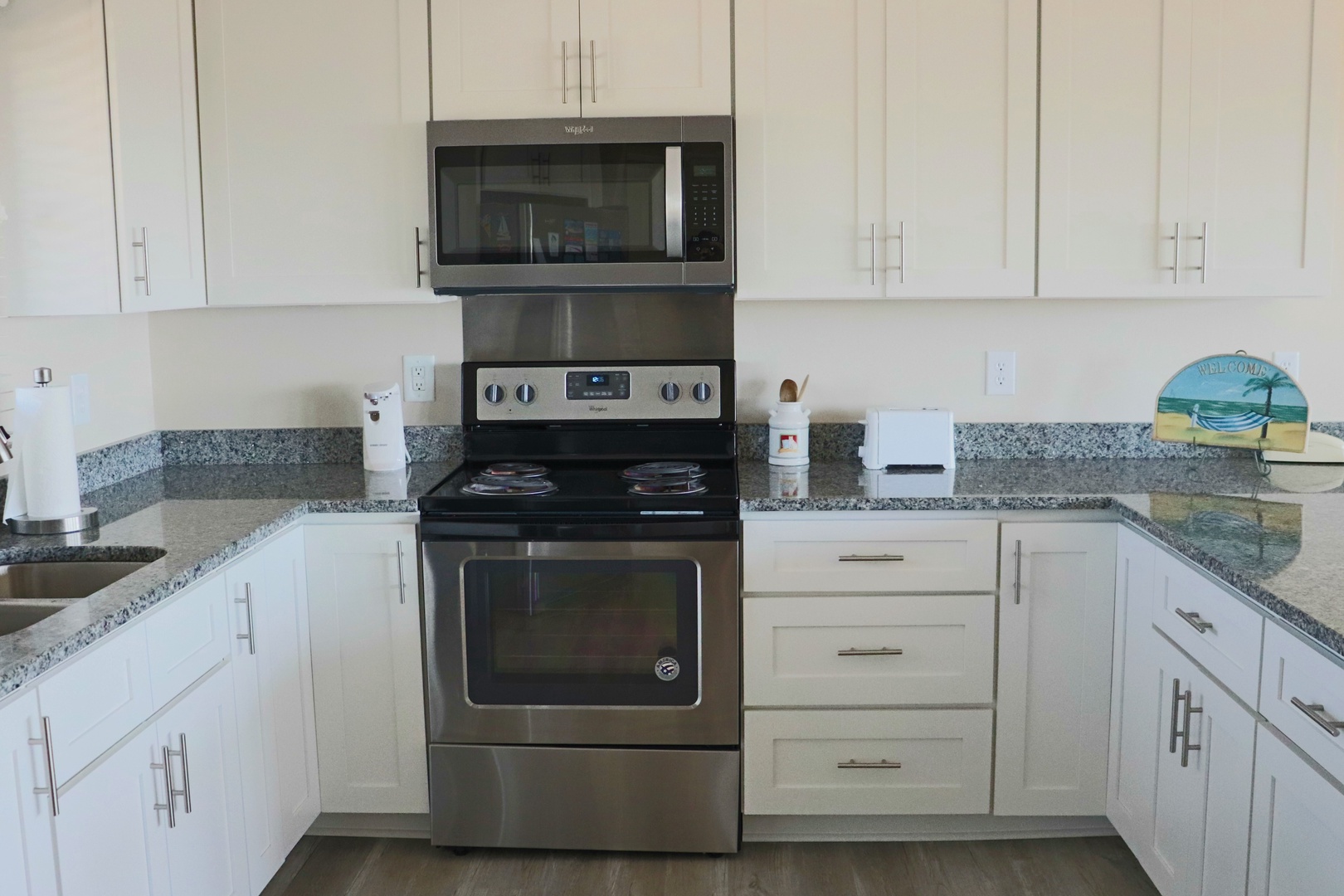 Your fully equipped kitchen awaits with granite countertops, stainless steel appliances, and plenty of cabinet space for all your culinary adventures.