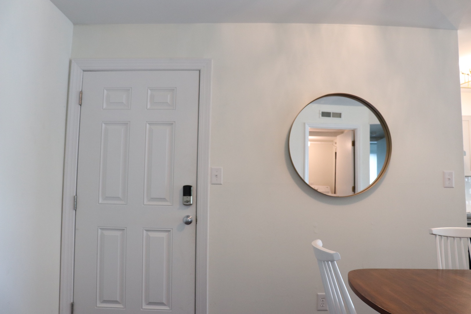 Step into your bright, welcoming entryway where clean lines and thoughtful touches create an instantly comfortable atmosphere.