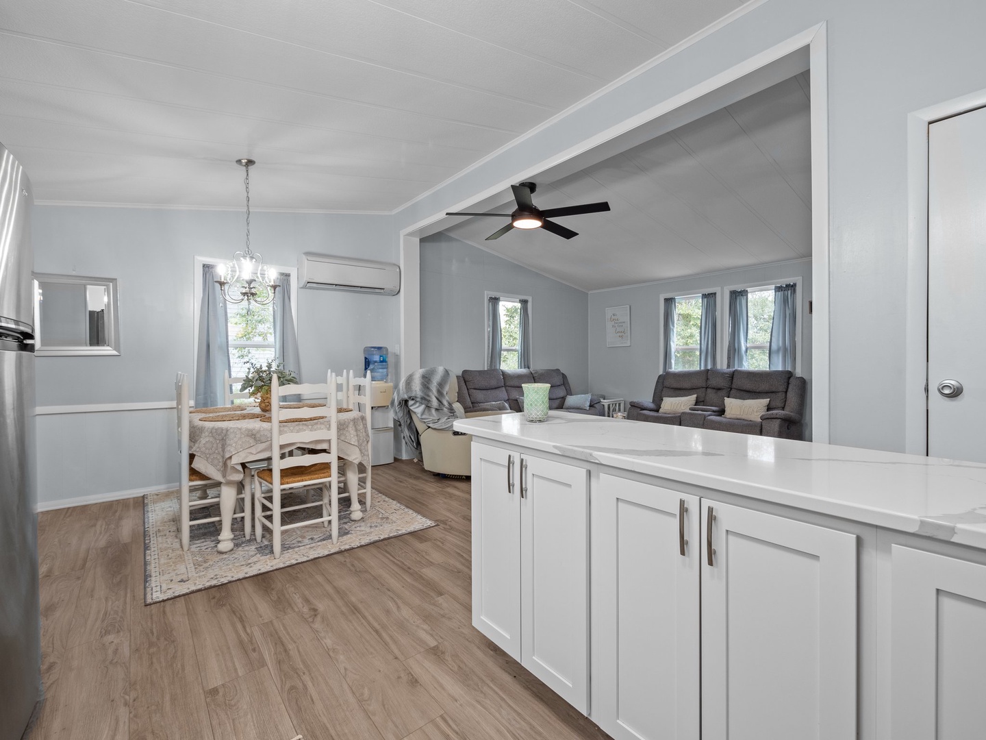 Your open-plan living area flows seamlessly from kitchen to dining to lounge, creating the perfect space for relaxing together.