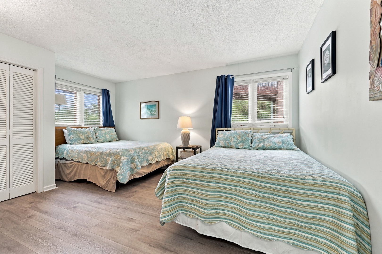 Settle into your serene bedroom with calming coastal tones and comfortable sleeping arrangements. The soothing color palette and natural light create a peaceful retreat where you can unwind after your adventures.