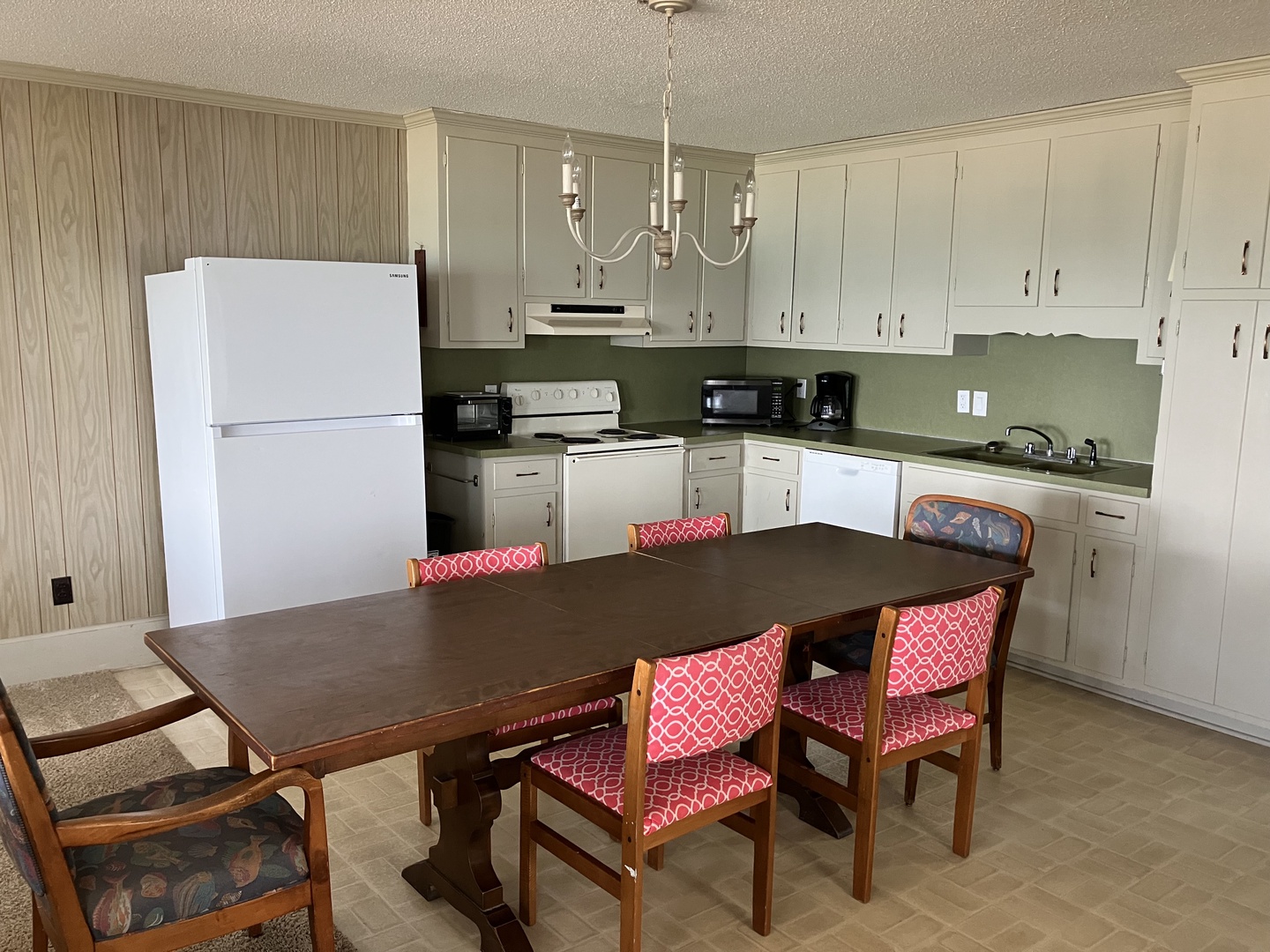 Your fully equipped kitchen offers everything for memorable meals - modern appliances, ample counter space, and cozy dining for six.