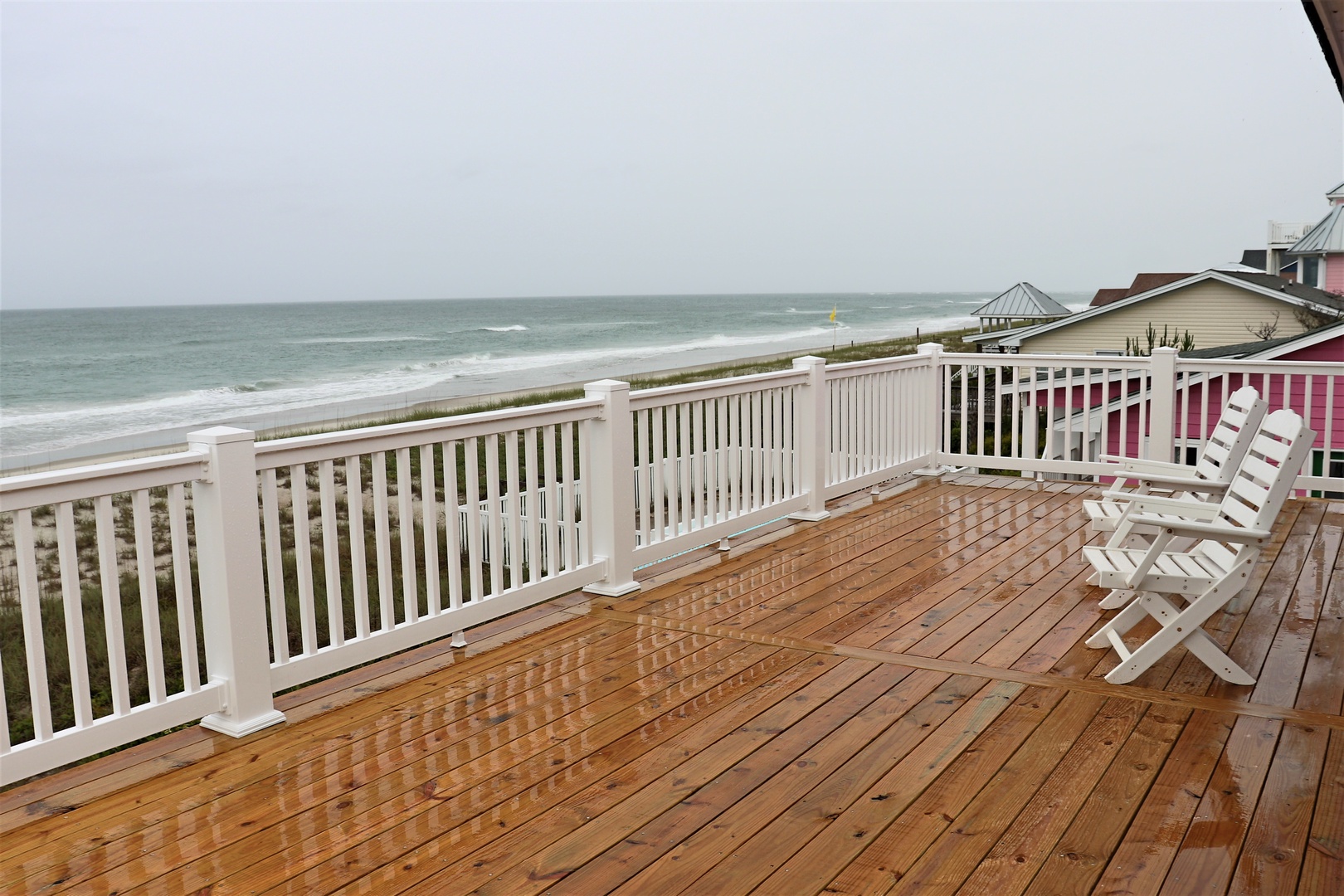 Unwind on your private oceanfront deck with sweeping sea views, where gentle waves and salty breezes create the perfect backdrop for relaxation.