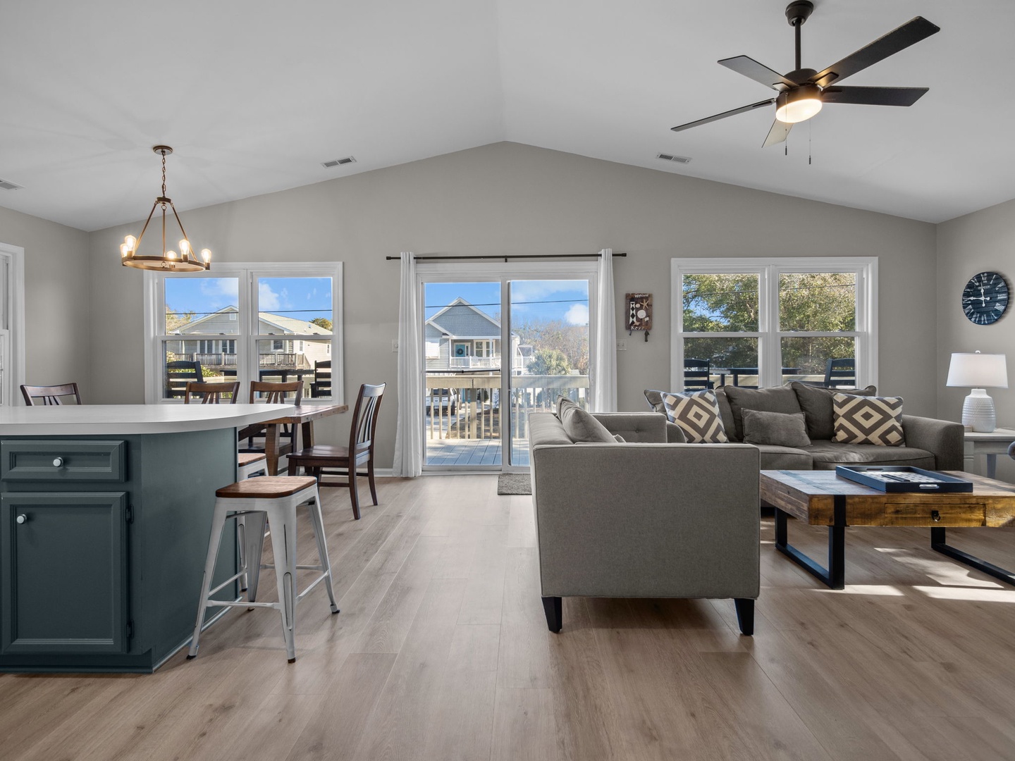 Relax in your bright, open living space with coastal views through floor-to-ceiling windows and your own private balcony access.