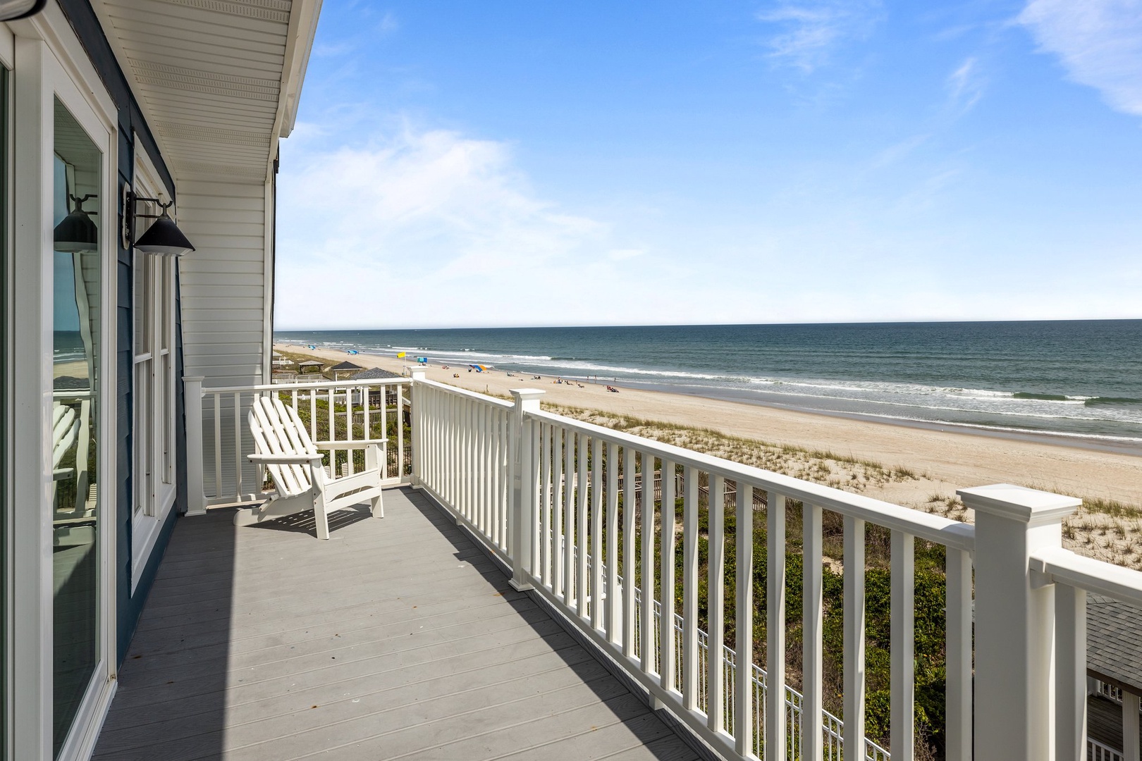 Stunning beachfront balcony offers endless ocean views and coastal breezes from your private retreat.