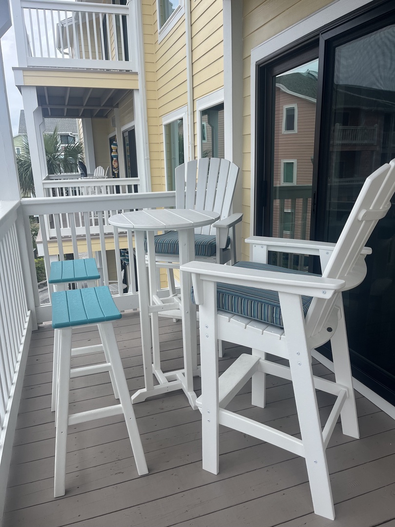 Step onto your private balcony and feel the warm tropical breeze while you admire the serene pool view below.