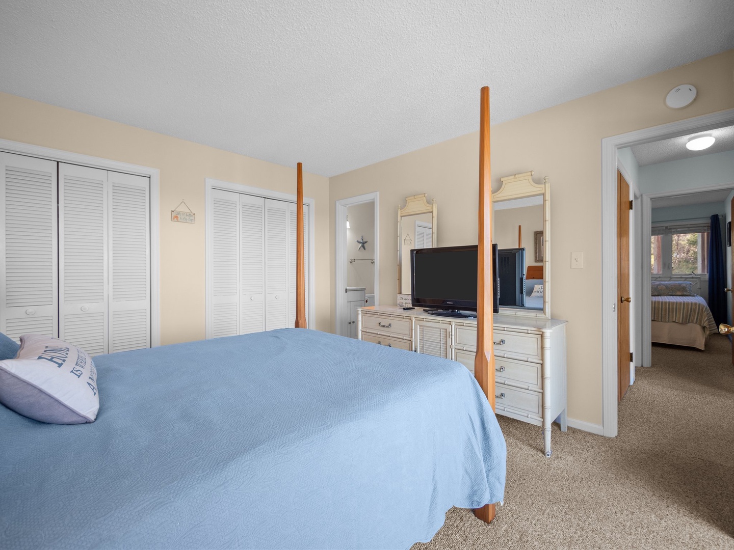 Wake up refreshed in your bright bedroom with plenty of storage, entertainment, and peaceful coastal-inspired decor throughout your stay.