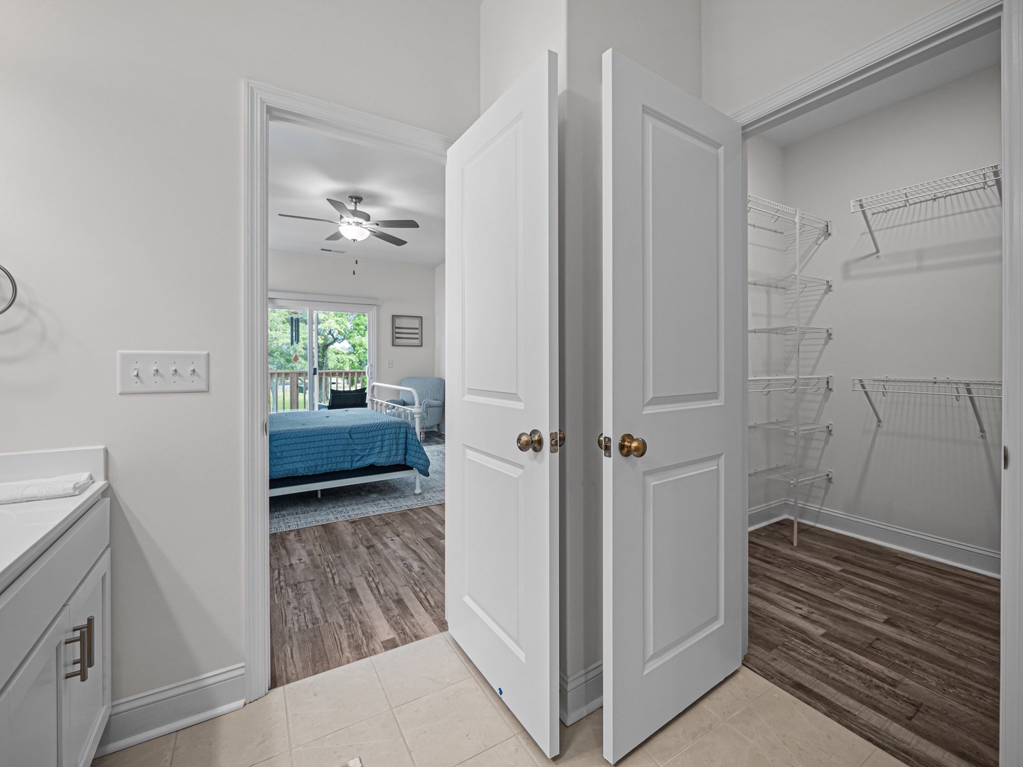Step into your serene bedroom sanctuary with convenient storage and laundry access right at your fingertips.
