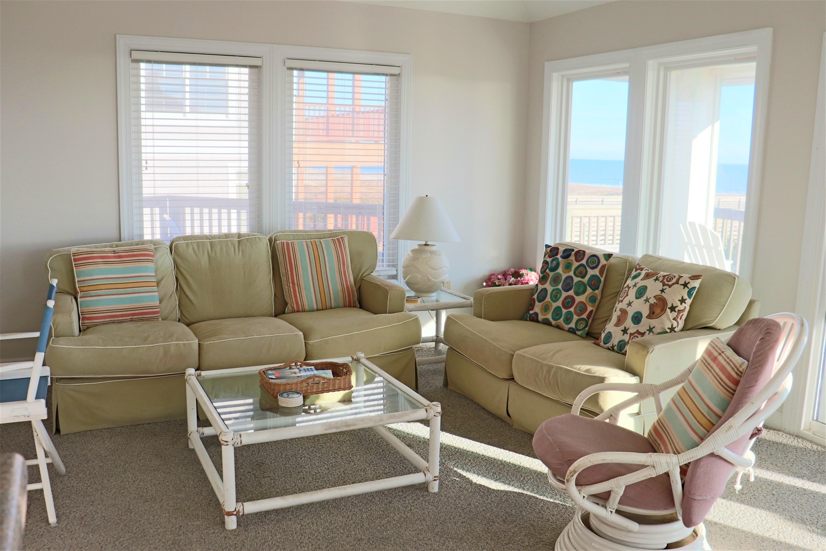 Sink into plush sofas with colorful pillows as natural light streams through your windows, creating the perfect spot to unwind after your adventures.