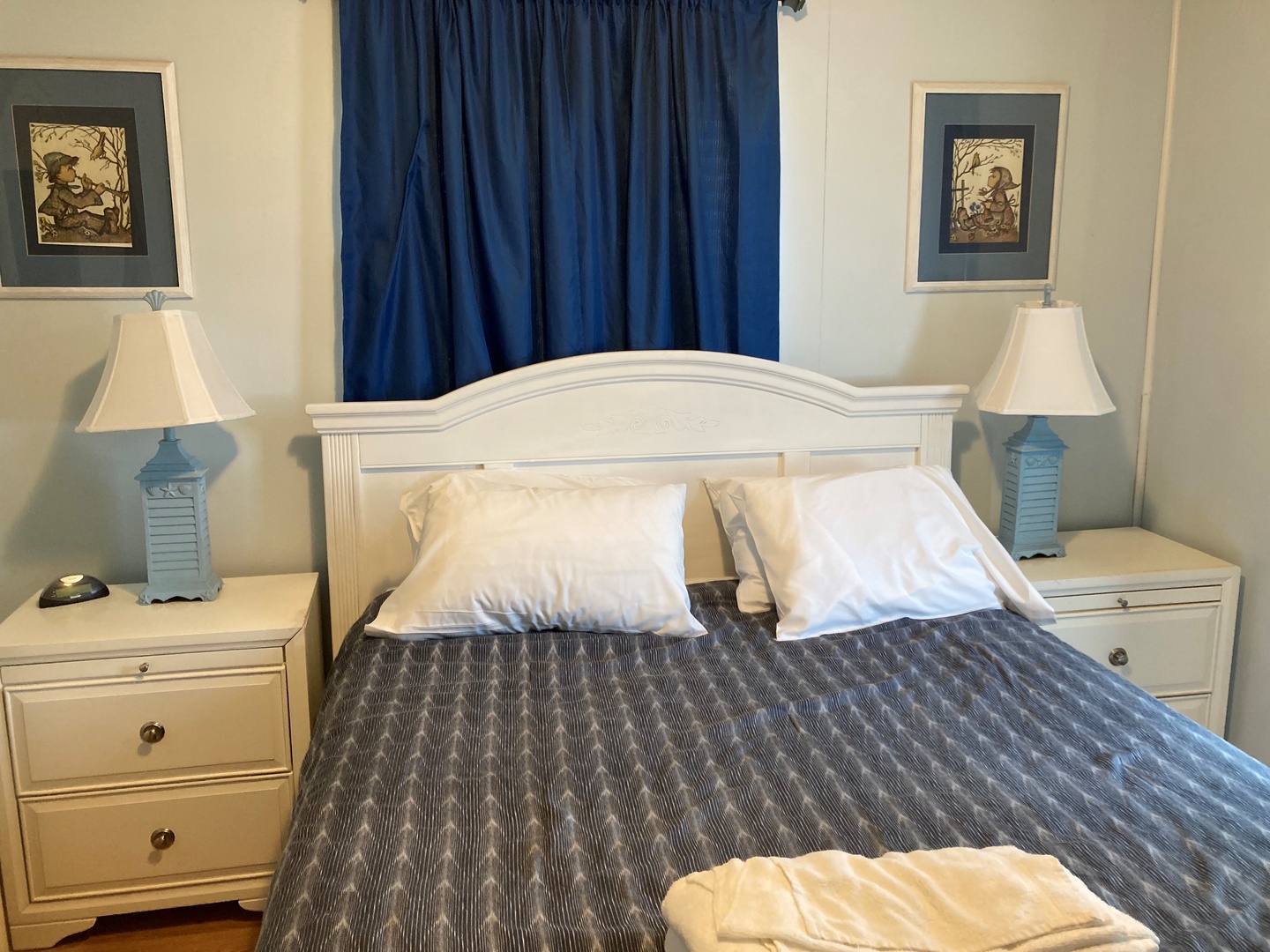 Sink into your peaceful retreat with crisp white linens and coordinated coastal décor that creates the perfect atmosphere for restful nights.