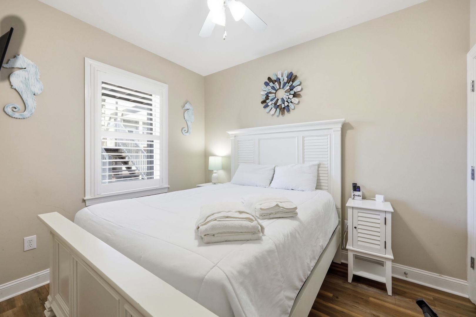 Slip into crisp white linens and enjoy your own coastal escape. The gentle seaside decor and peaceful color palette create a calming retreat after a day of adventure.