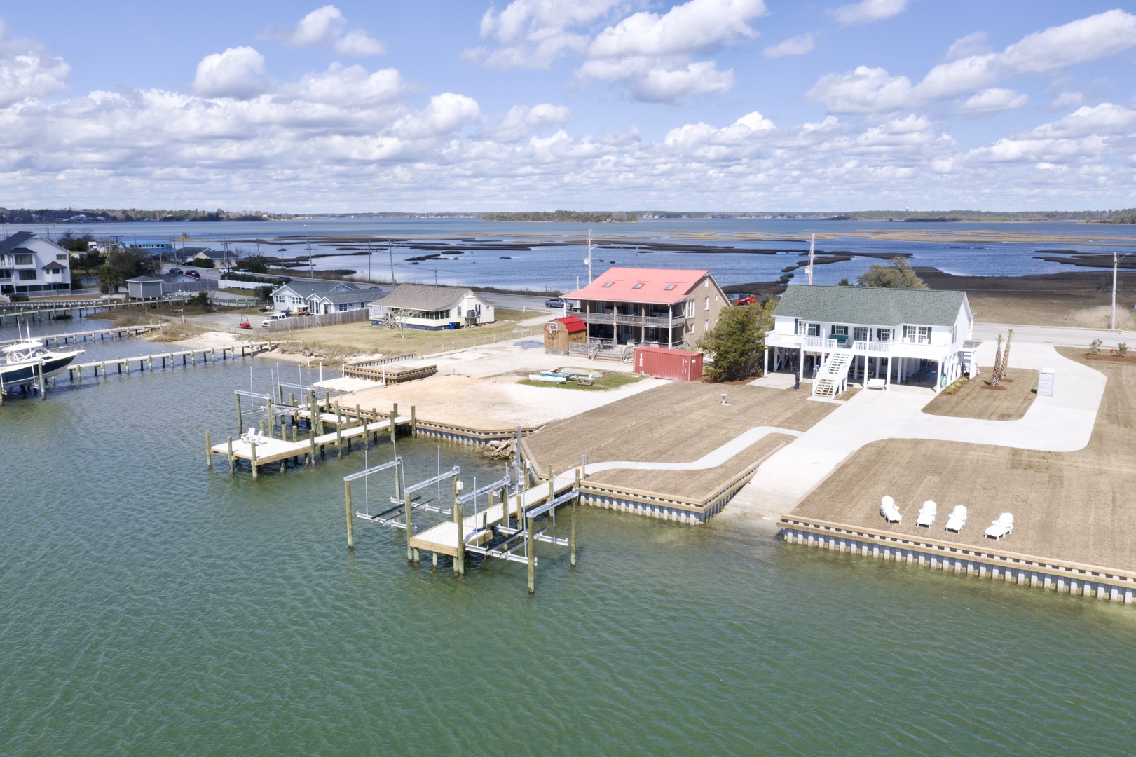 Spectacular waterfront property features private dock access and expansive bay views in a peaceful coastal setting.