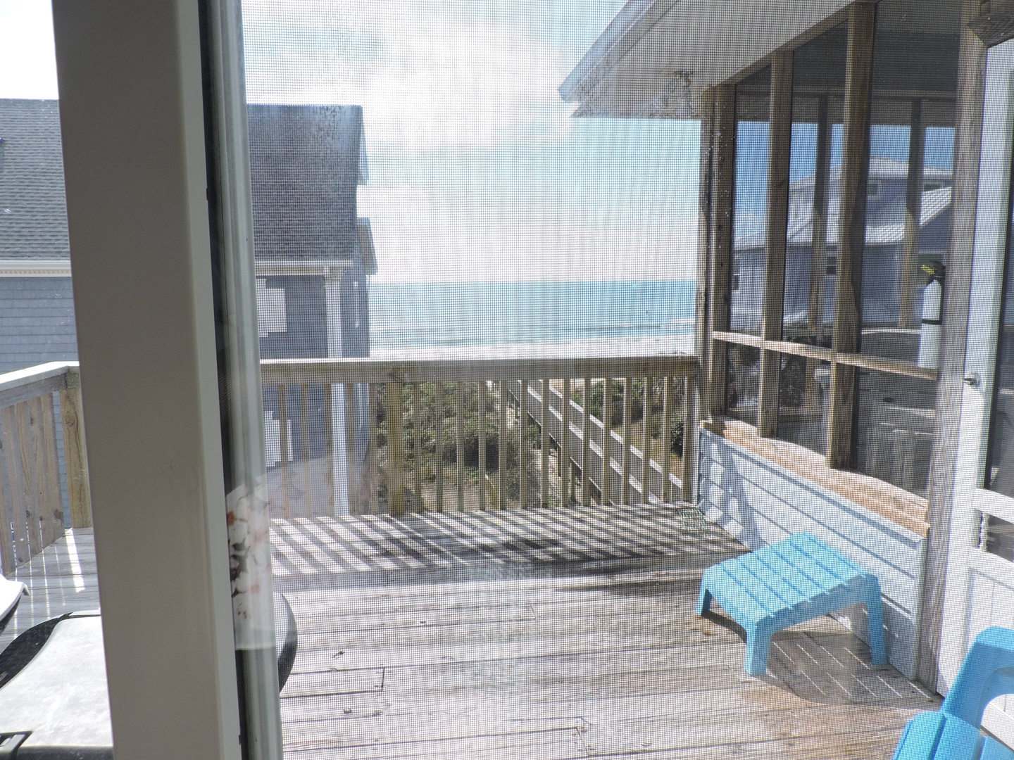 Beachfront deck offers stunning ocean views with convenient access to your private outdoor space and coastal serenity.