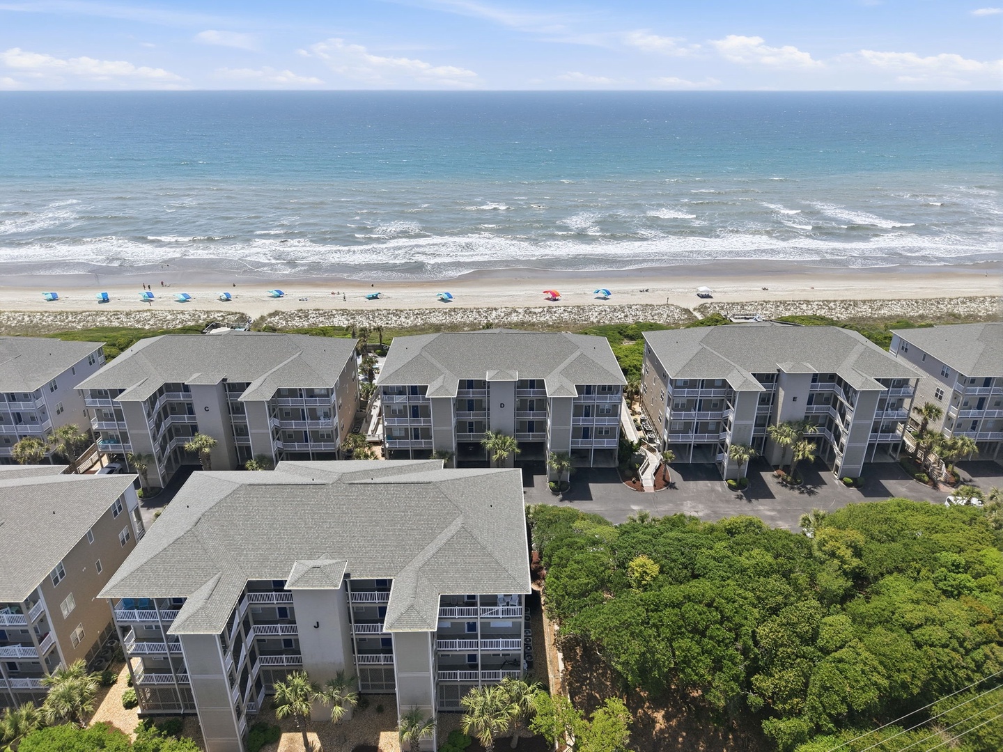 Beachfront property with direct access to sandy shores, gentle waves, and coastal views. Guests enjoy easy beach access just steps from their accommodations.