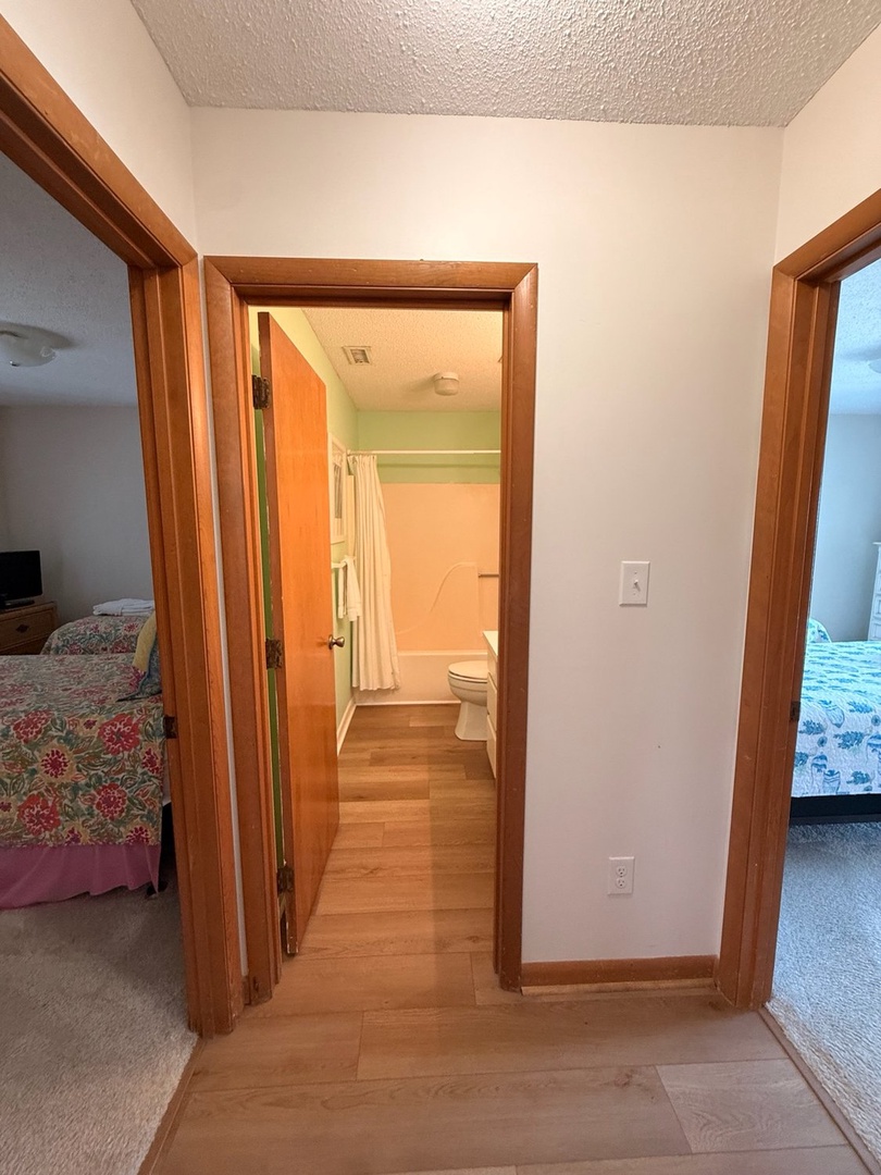 Your private bathroom sits conveniently between two comfortable sleeping areas, offering easy access and a fresh, clean space to refresh after a day exploring.