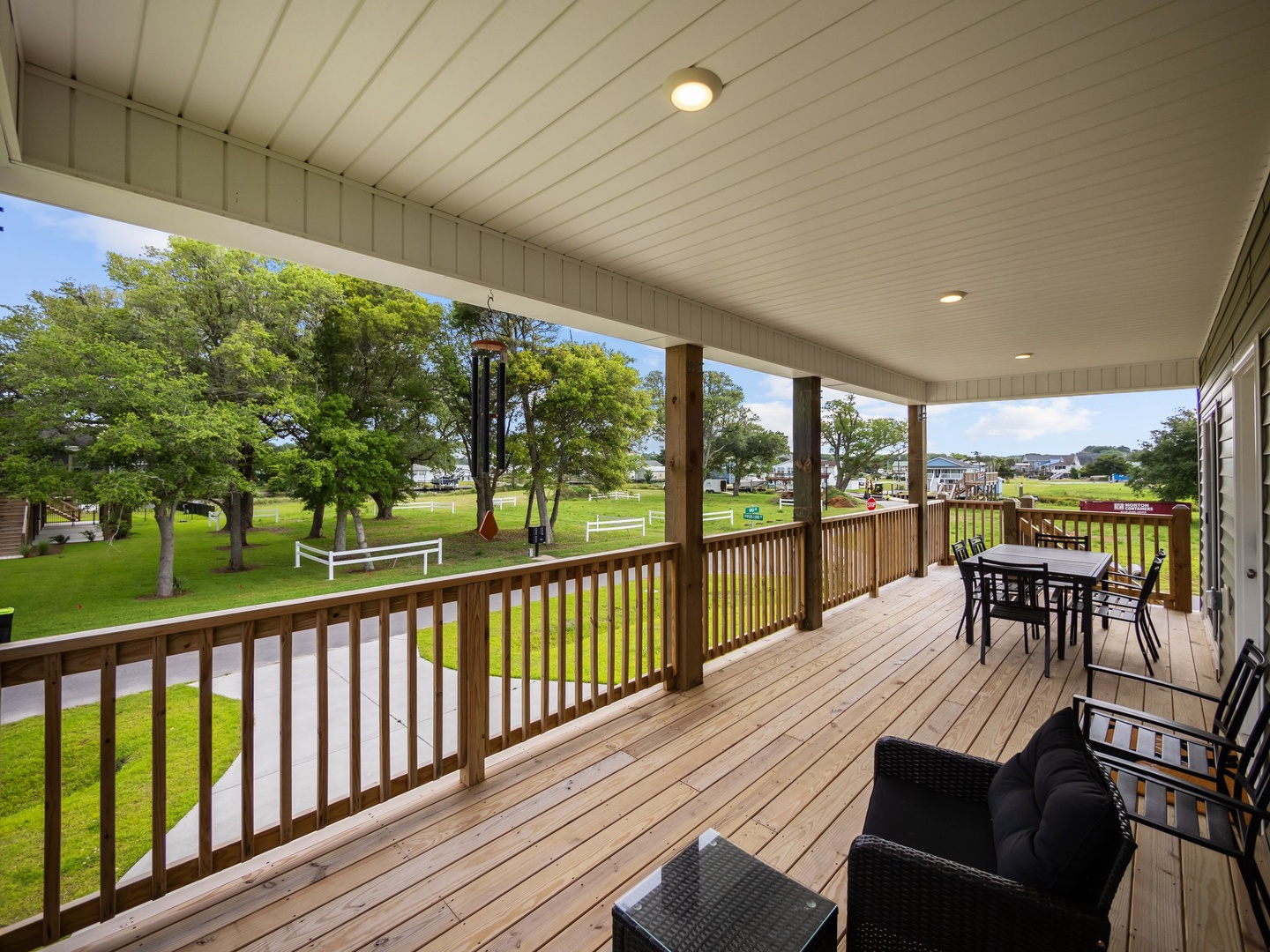 Relax on your spacious covered deck with park views, complete with dining and lounge furniture for perfect outdoor entertaining.