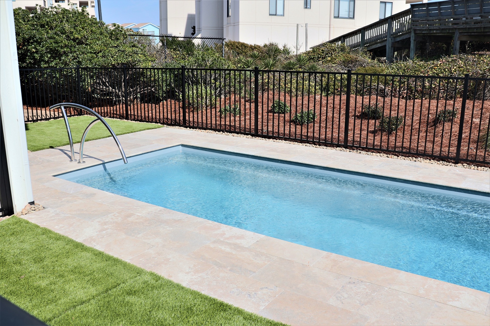 Your private pool awaits, surrounded by manicured lawns and landscaped gardens—perfect for refreshing dips and peaceful relaxation in your own backyard oasis.