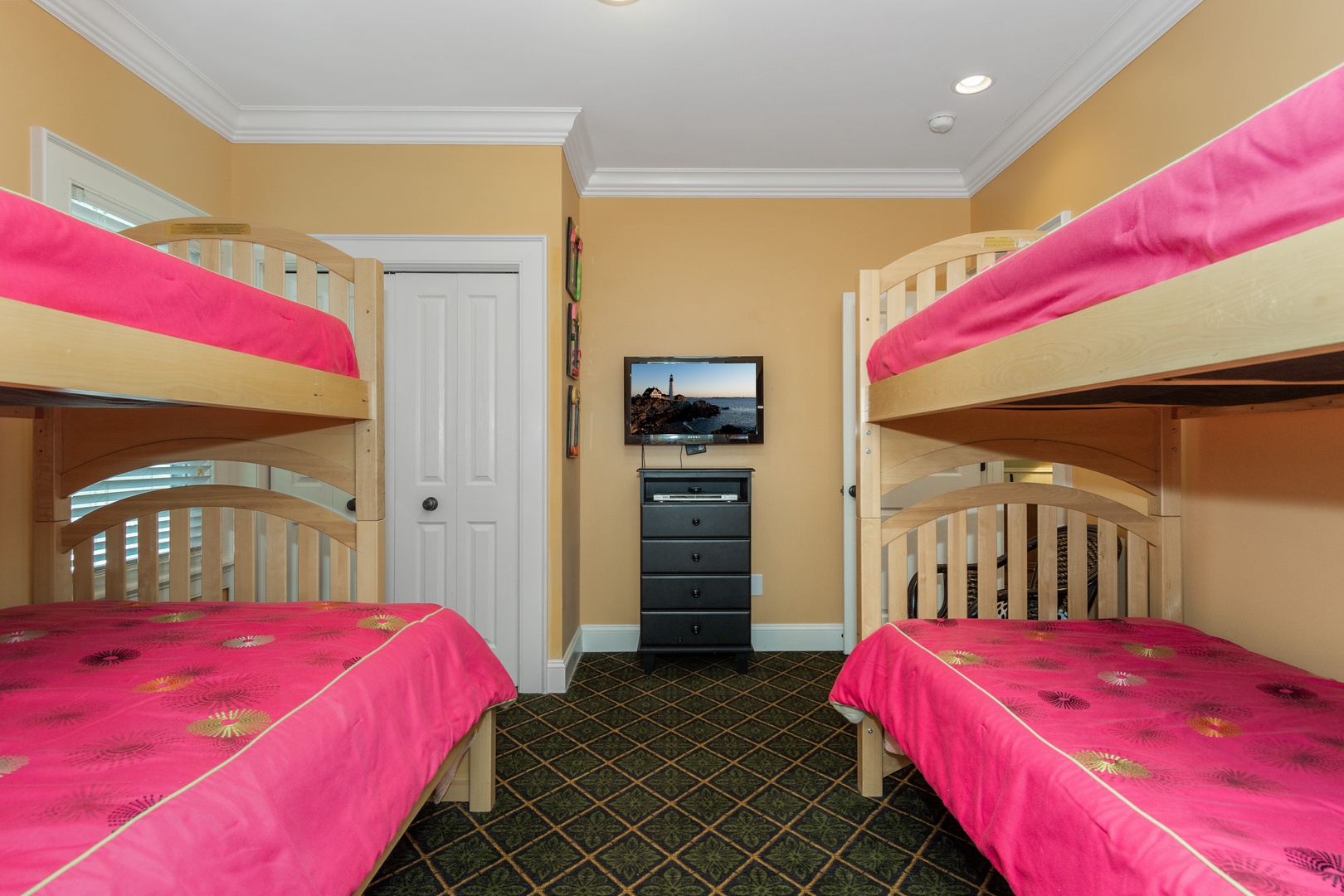 Your kids will love these bright pink bunk beds with plenty of space to play and relax together.