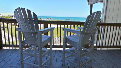 Settle into these cozy Adirondack chairs on your private deck and watch the waves roll in with unobstructed ocean views.