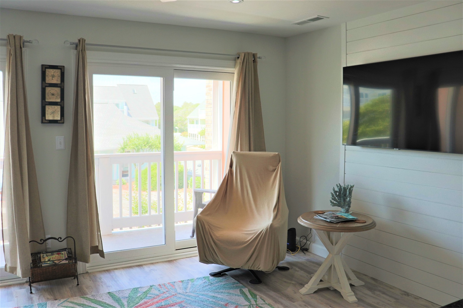 Relax in your bright living space with sliding door access to your private balcony and peaceful neighborhood views.
