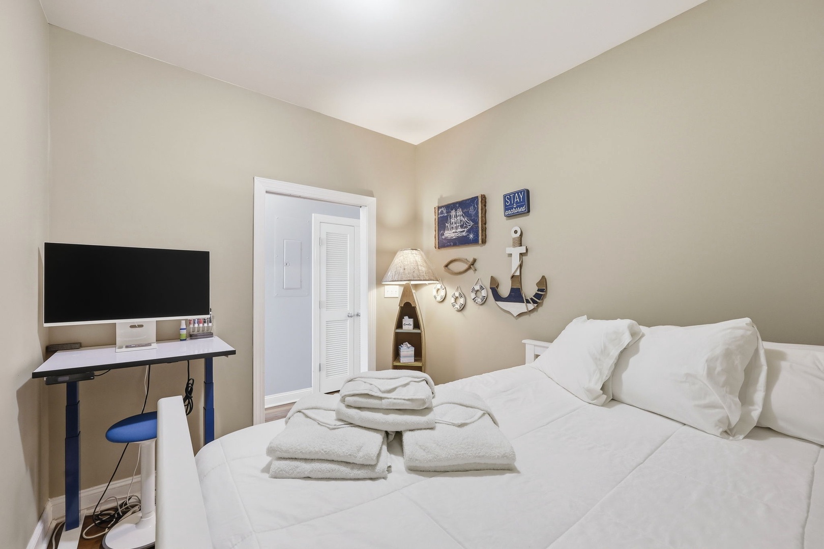 Sink into crisp linens and coastal charm, where nautical touches and a flat-screen TV make your retreat feel effortlessly relaxing and welcoming.