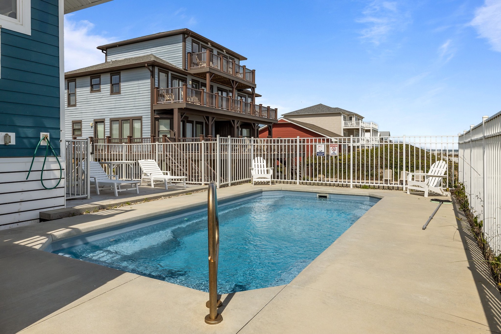 Private pool surrounded by comfortable lounge chairs where you can soak up the sun and unwind in complete relaxation.