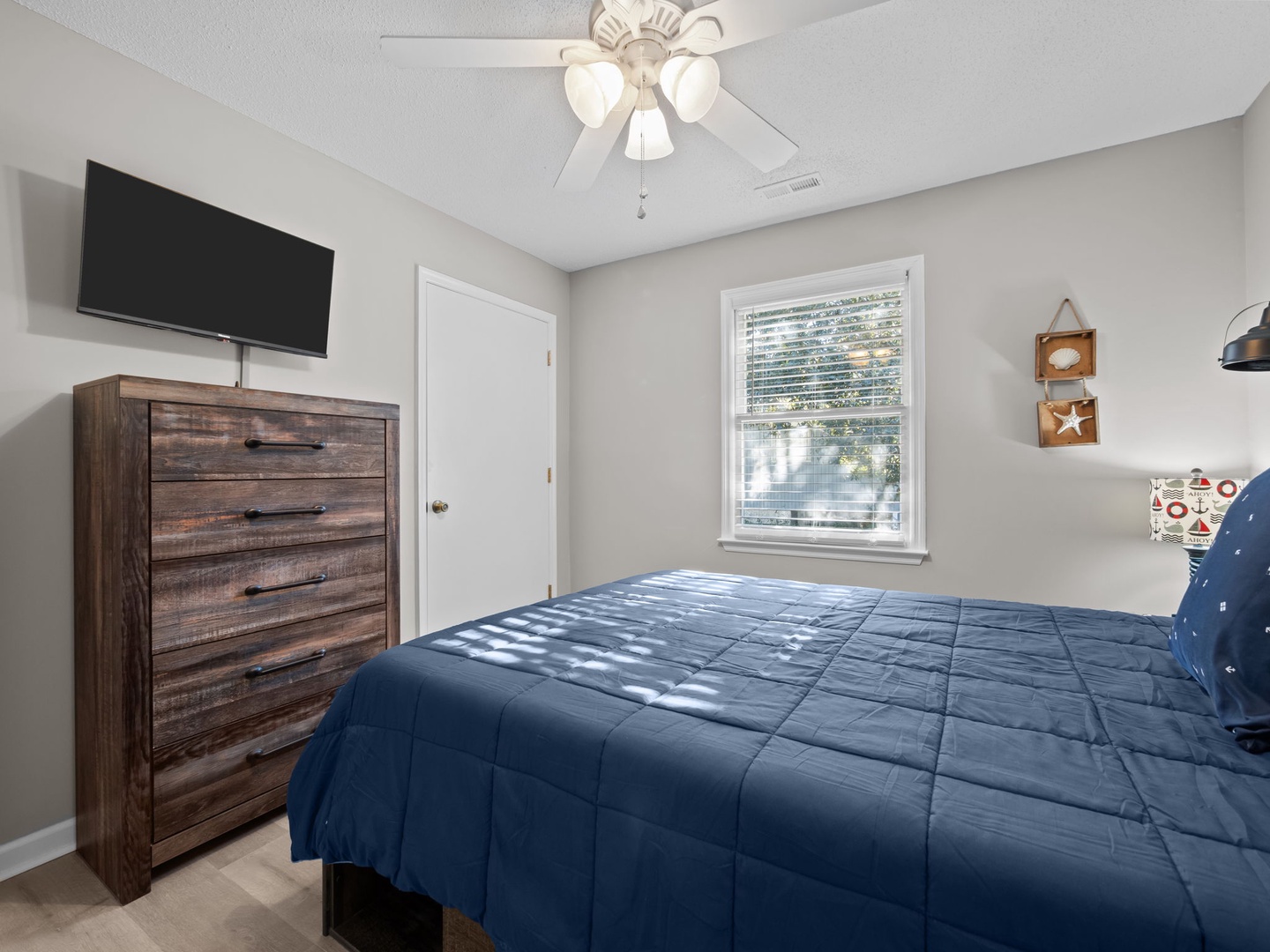 Rest peacefully in your comfortable bedroom with soft natural light, entertainment options, and ample storage space for all your belongings.