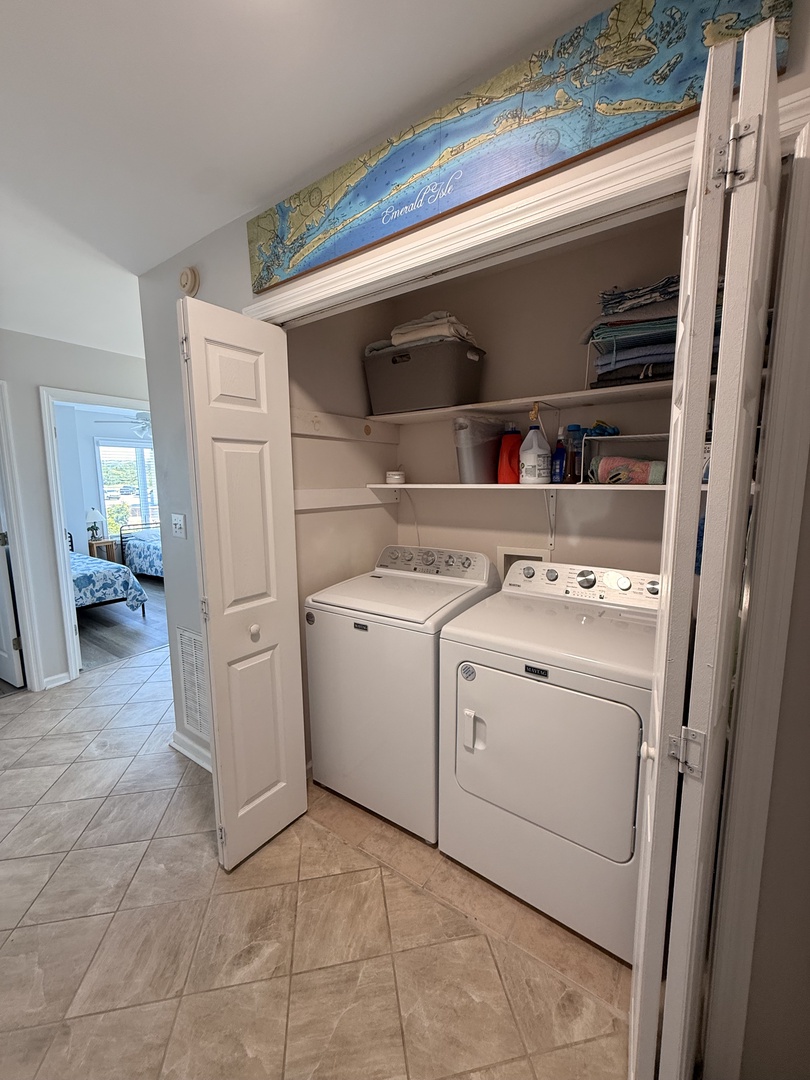 Keep your wardrobe fresh with an in-unit washer and dryer, plus convenient storage. You'll appreciate the tidy closet space and easy laundry access during your stay.