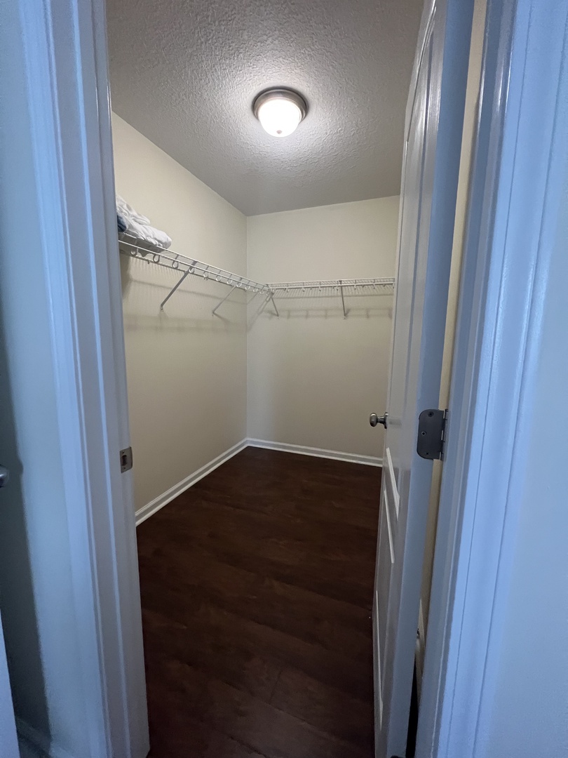 Your private bathroom features a clean walk-in shower with glass doors, perfect for refreshing after a day of adventures.