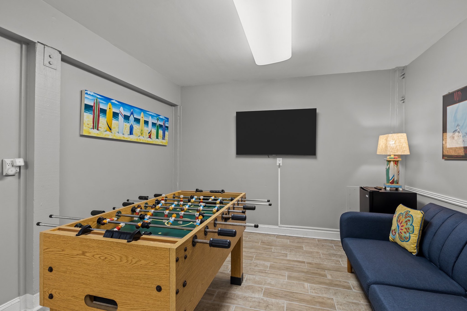 Challenge friends to foosball in your private game room, complete with comfy seating and entertainment for hours of fun.