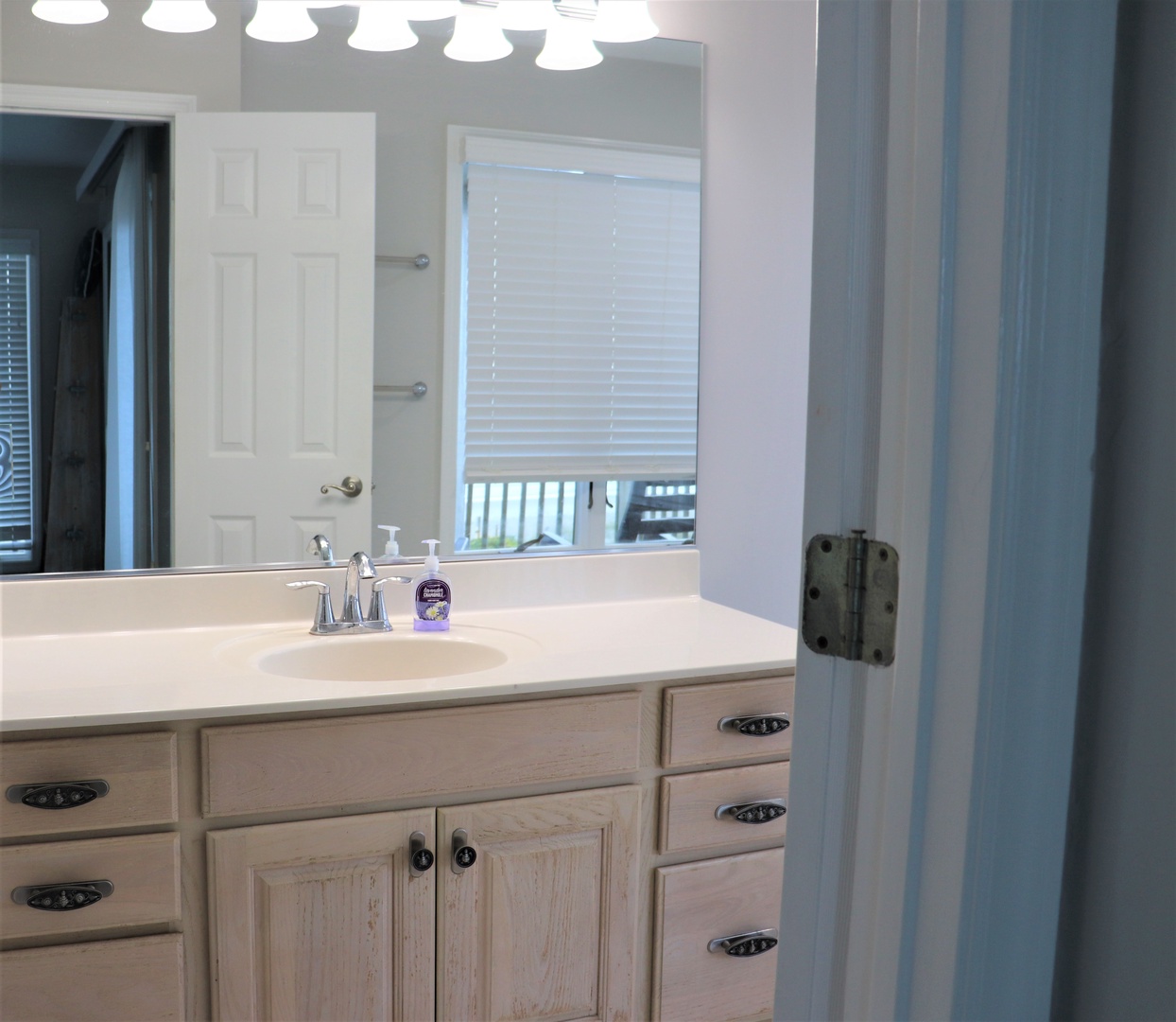 Step into your spa-like bathroom with elegant vanity, designer lighting, and abundant storage for a refreshing start to each day.