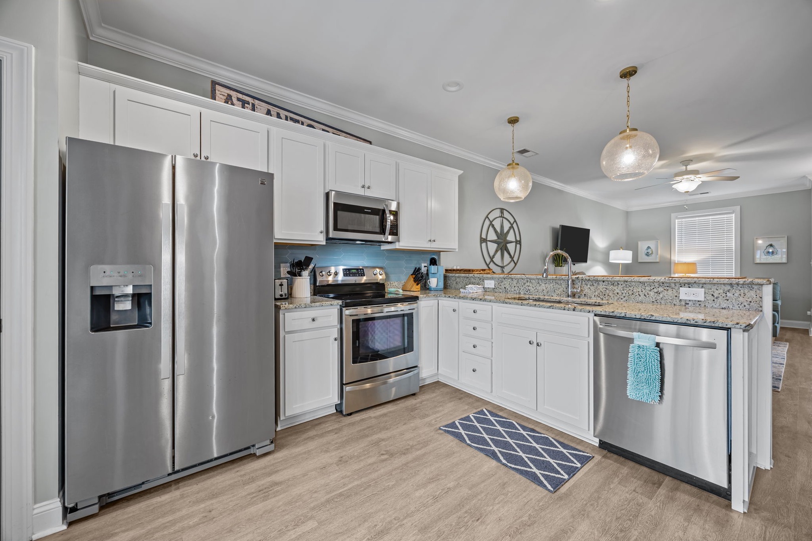 Your fully equipped kitchen features gleaming stainless steel appliances and granite countertops, perfect for preparing family meals.