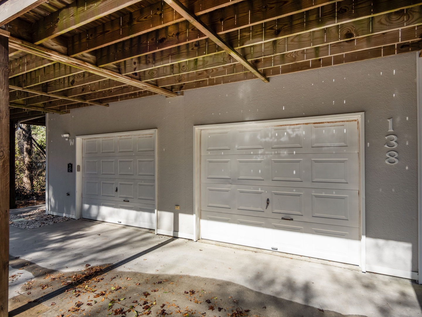 Covered parking garage with two-car capacity provides secure storage for your vehicles during your stay.