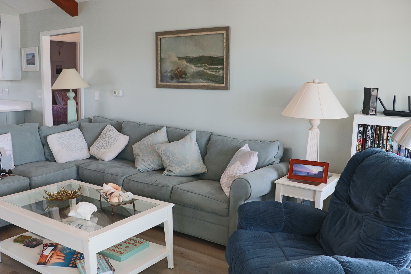 Sink into the plush sectional sofa with soft throw pillows, perfect for unwinding after your adventures.