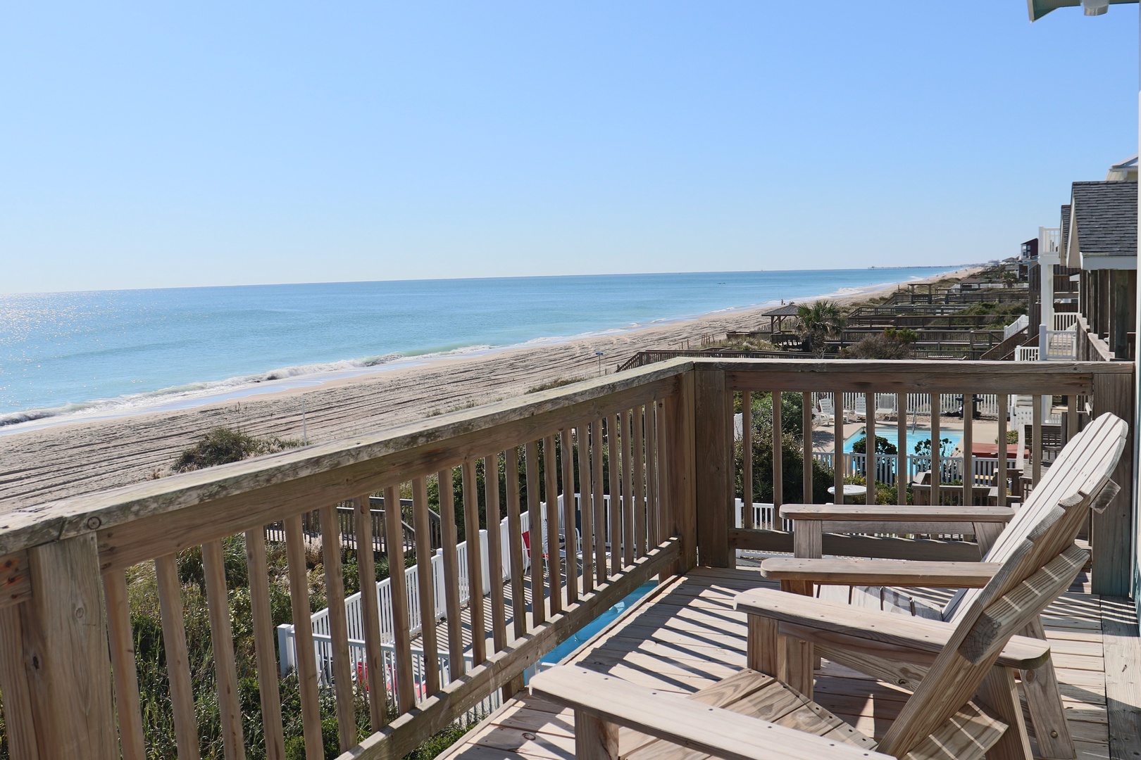 Relax on your private deck with stunning ocean views, where morning coffee and endless beach vistas create the perfect coastal retreat.
