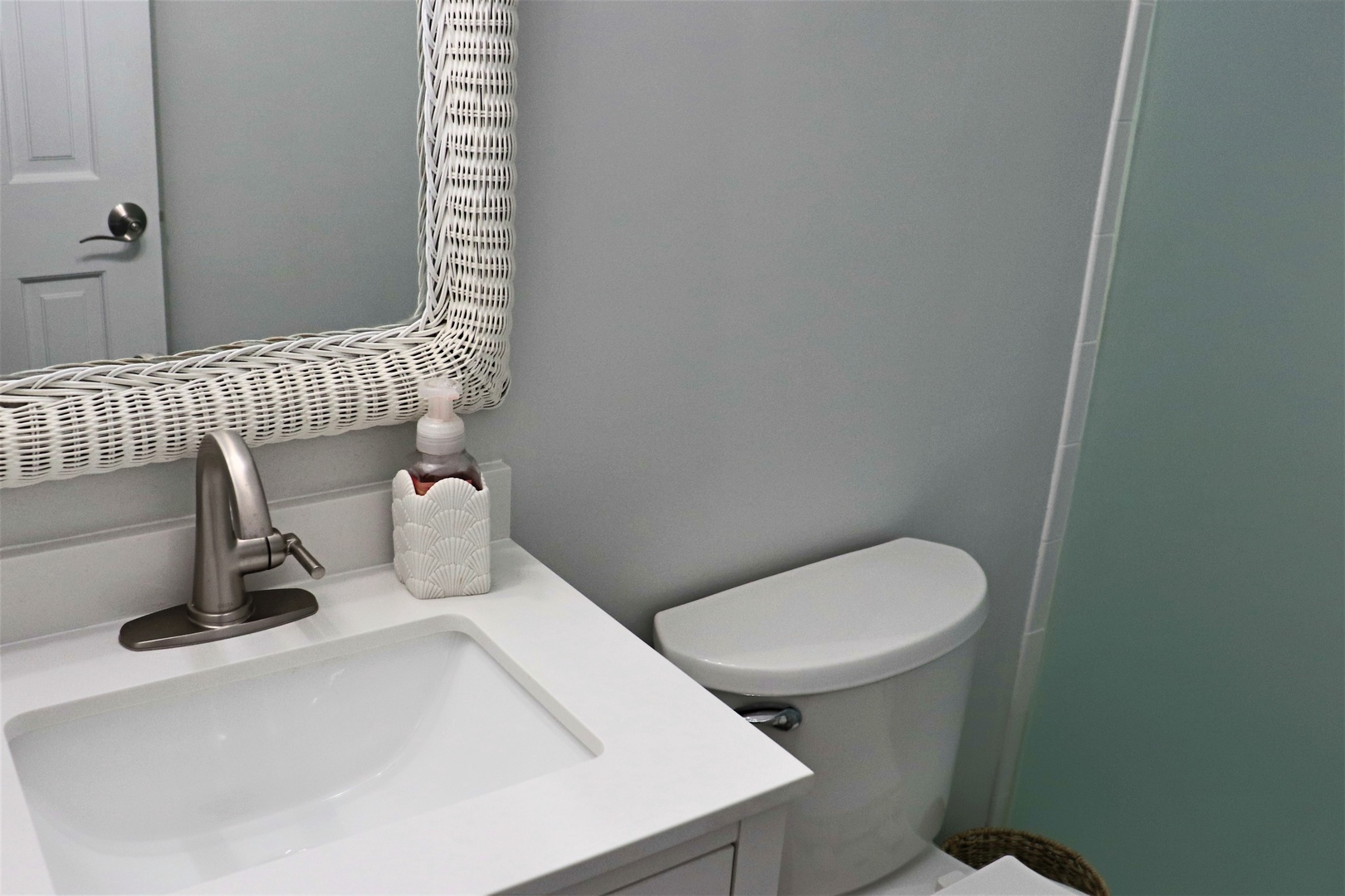 Your private bathroom features a sleek sink with modern fixtures and thoughtful amenities for your comfort.