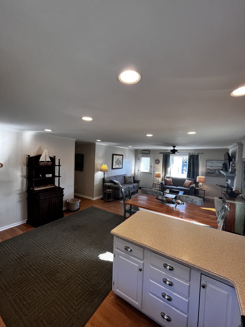 Prepare your favorite meals in this fully equipped kitchen featuring modern appliances, ample counter space, and stylish cabinetry for all your cooking needs.