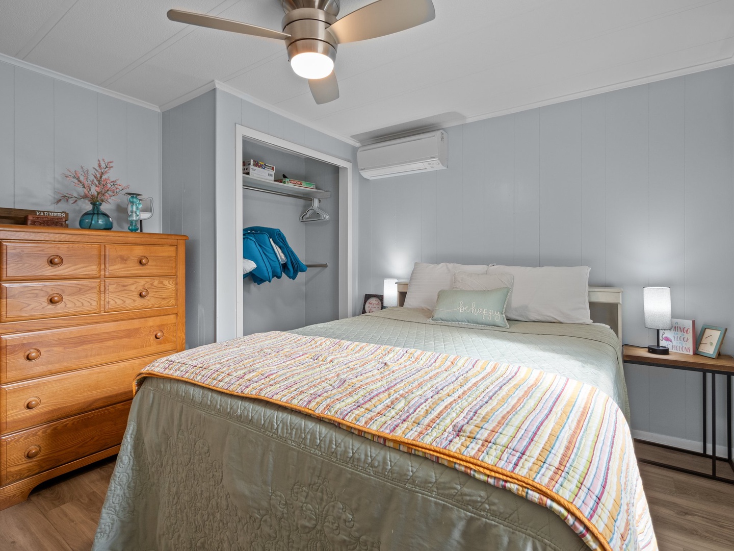 Drift into dreamland in your cozy bedroom with soft linens and a gentle ceiling fan keeping you comfortable all night long.