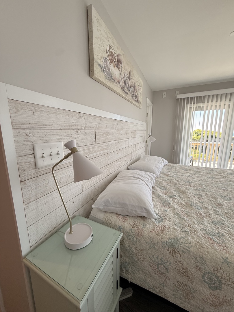 A modern bedroom featuring soft textures, natural light, and serene minimalist design—your peaceful retreat awaits.