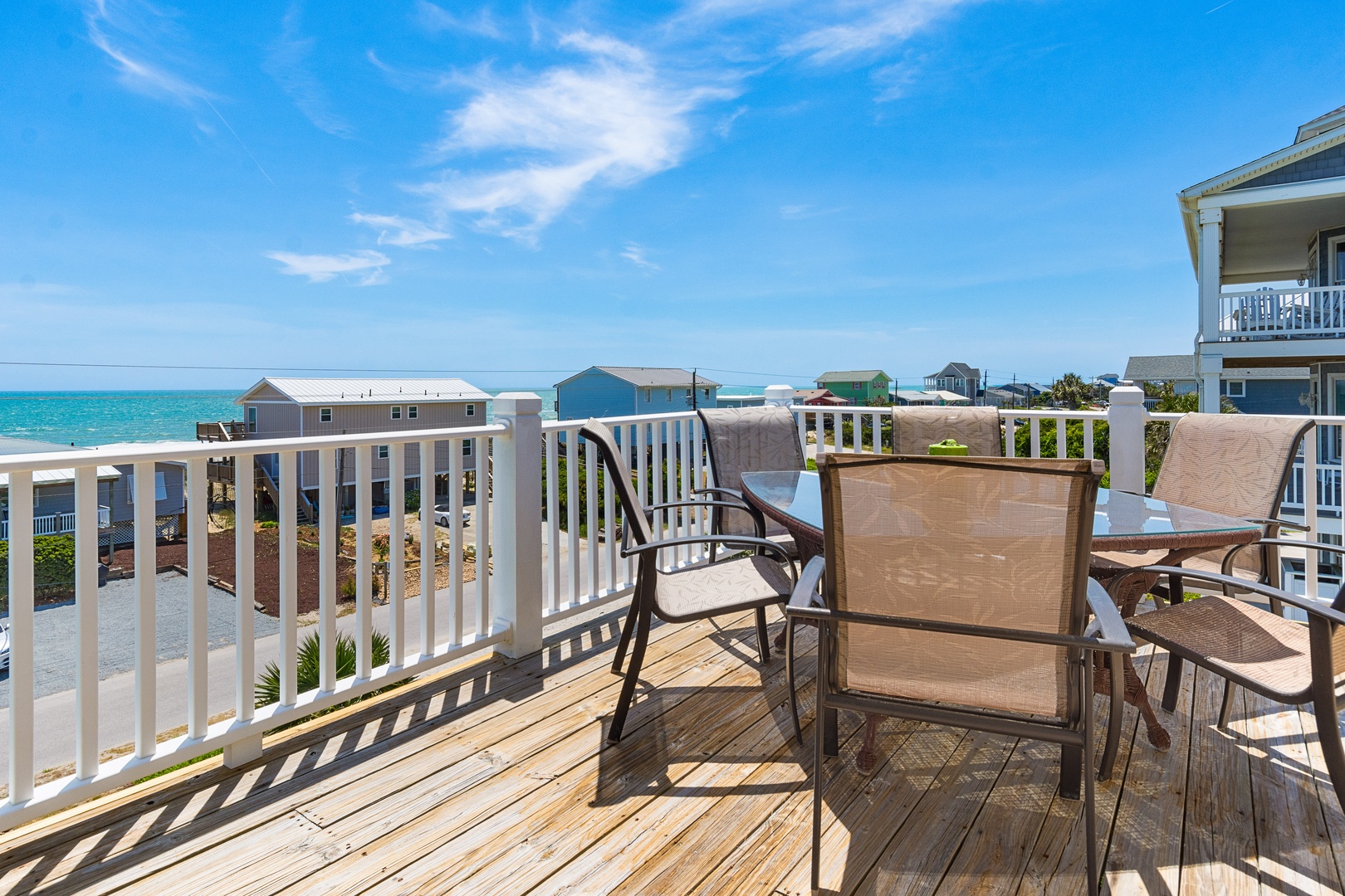 Soak up stunning ocean views from your private deck, where morning coffee and sunset drinks become unforgettable moments overlooking the sparkling coastline.