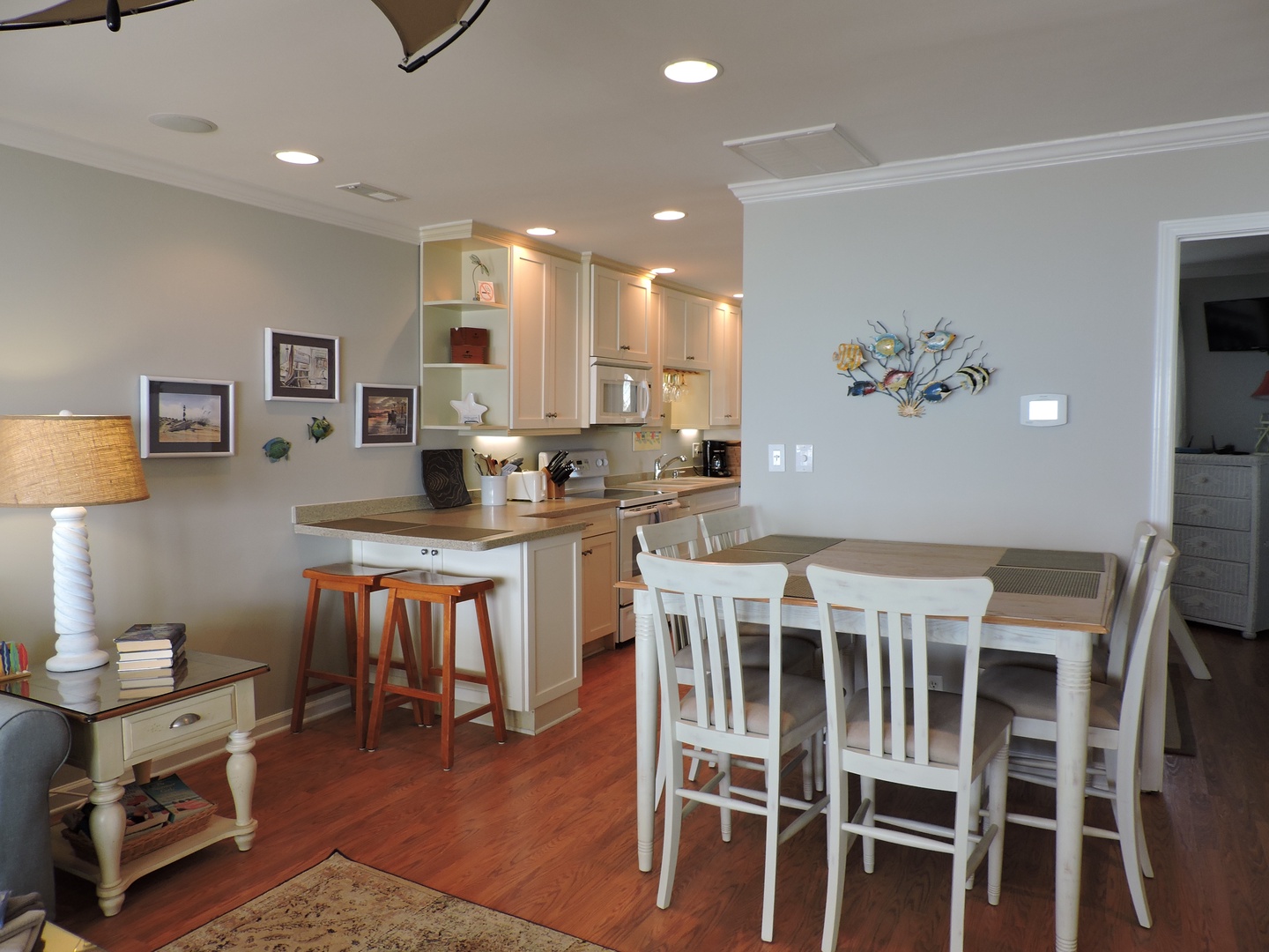 Your open-concept kitchen and dining space flows seamlessly, perfect for cooking meals and gathering with loved ones in comfort.